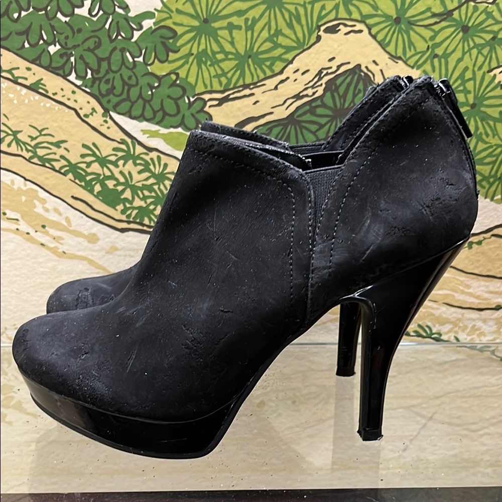 Unlisted Black Heeled Boots with Ankle-High Design
